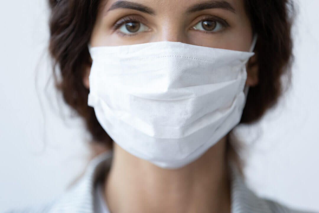 Close up of female wearing face mask