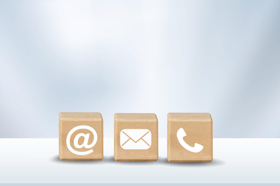 wooden black with symbols for email, post and telephone