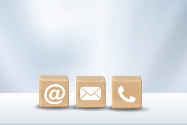 wooden black with symbols for email, post and telephone