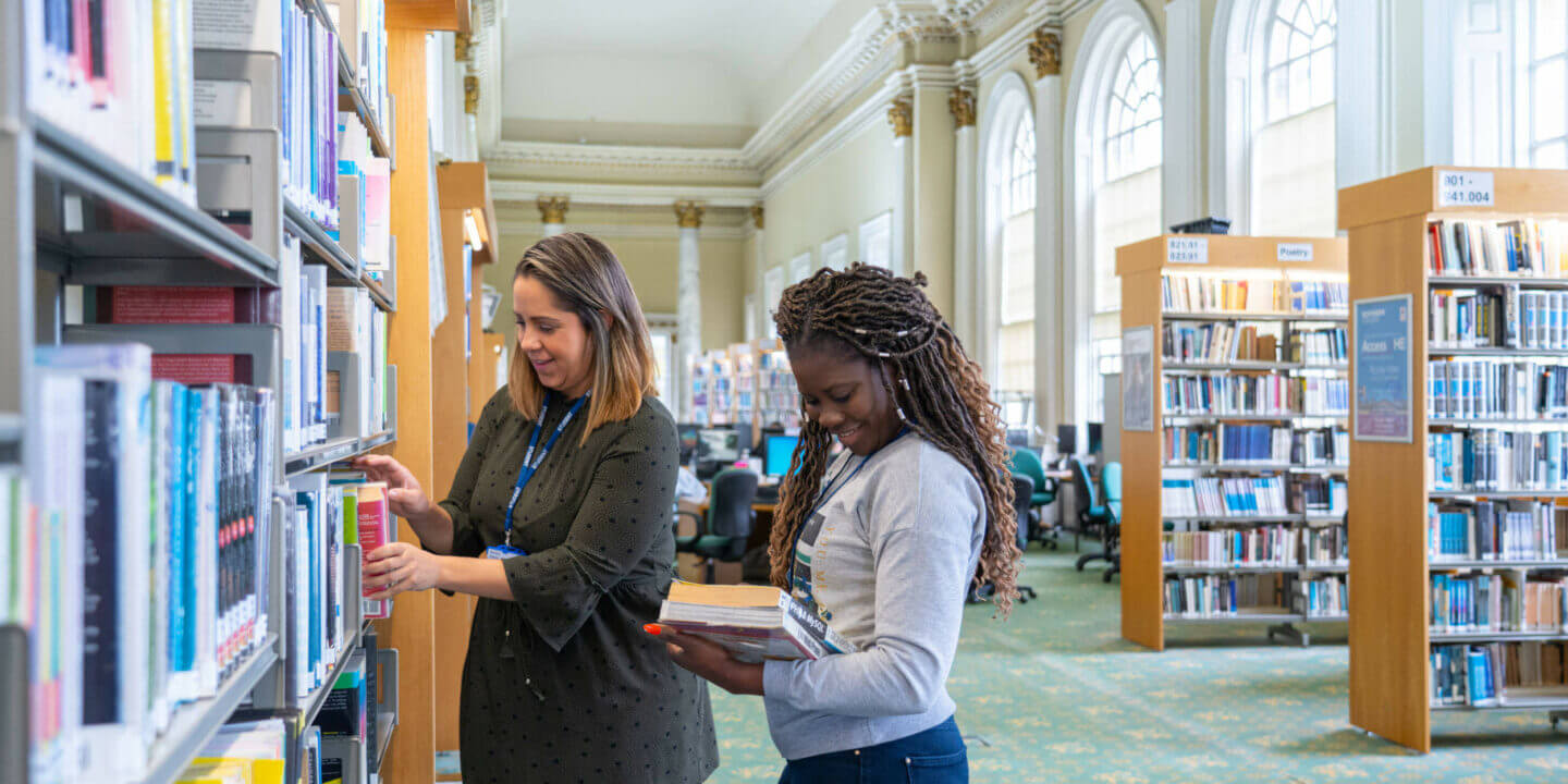 2 female students in Northern College Library