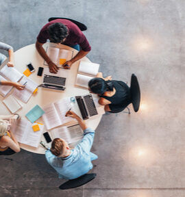 people sitting around a table viewed from above