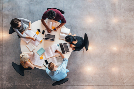 people sitting around a table viewed from above