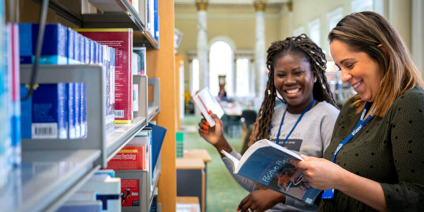 smiling students in library